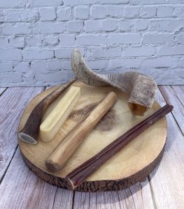 selection of chews for teething puppy